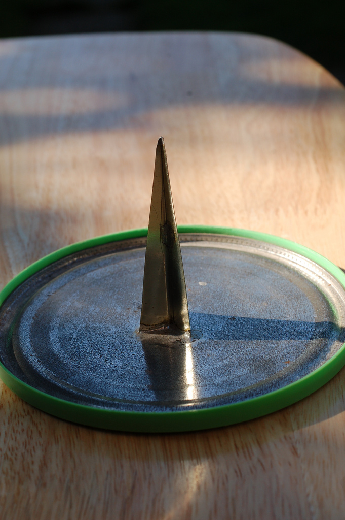 A tinplate tri-wing spike made from an old bean can, soldered to the top of a bean can