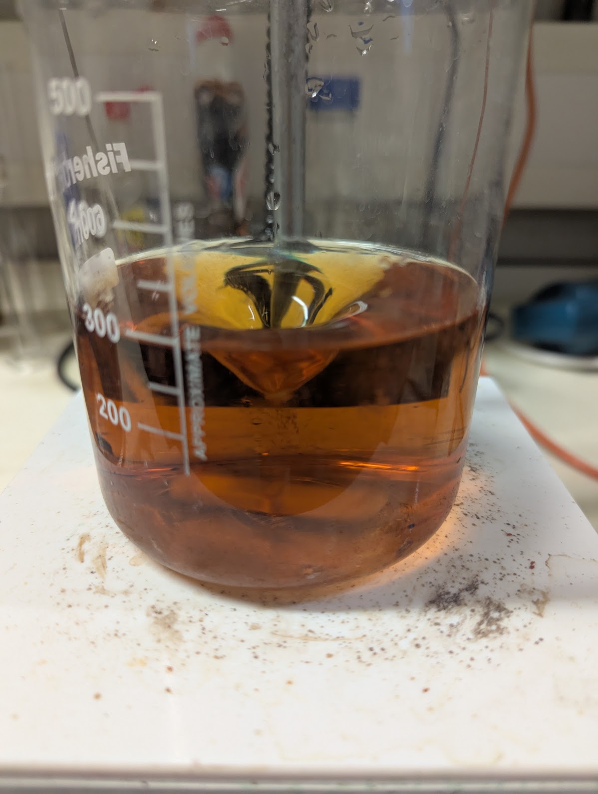 A dirty red/orange solution.
